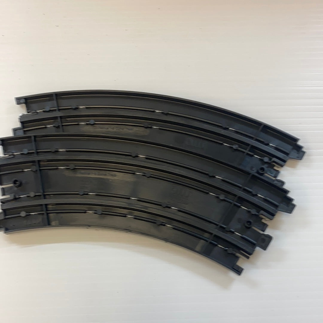 Curved model train track pieces, black, for laying out a track section for Auto World Track H0003