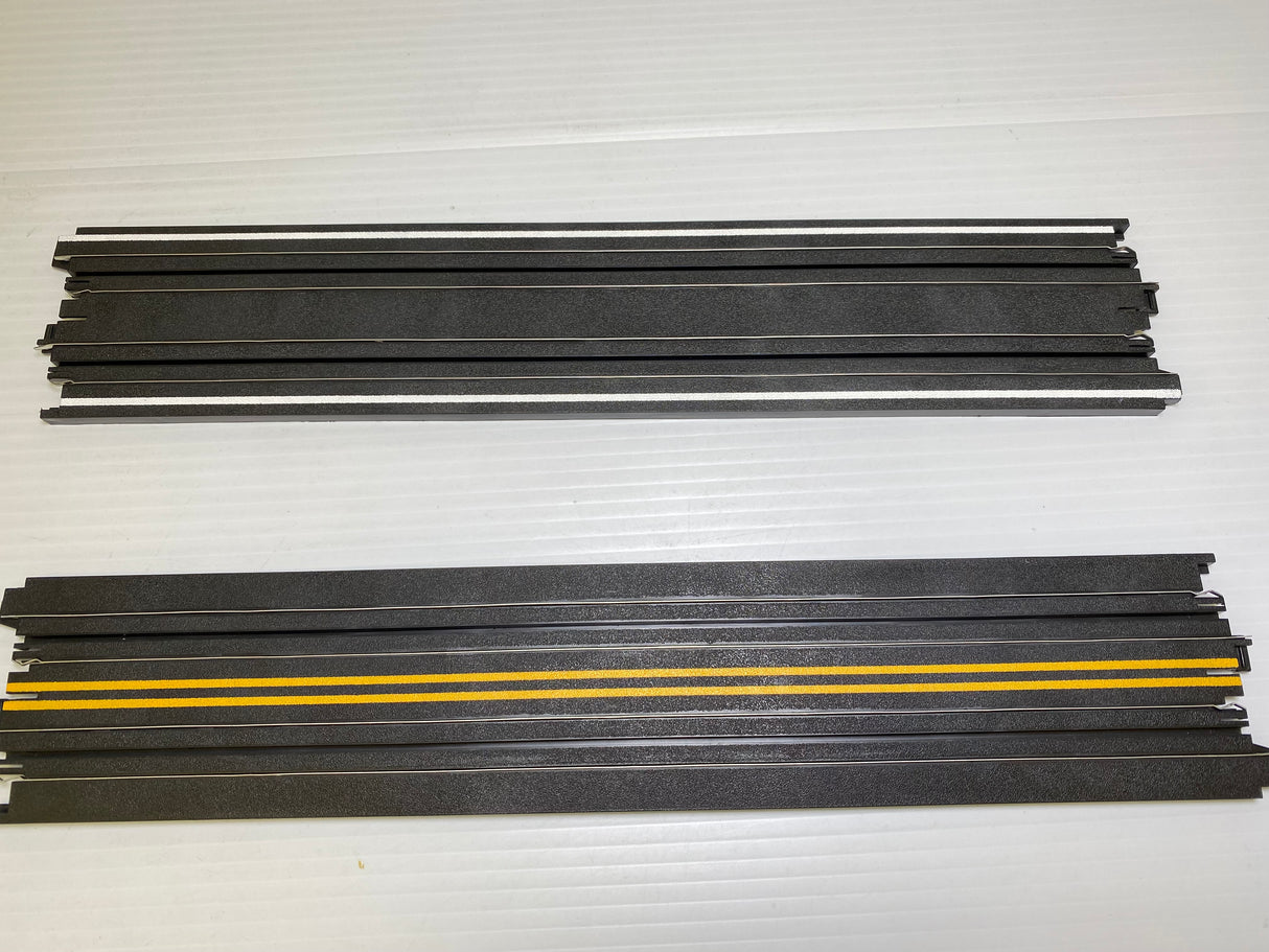 Bulk set of black and yellow model train track pieces for Auto World H0045