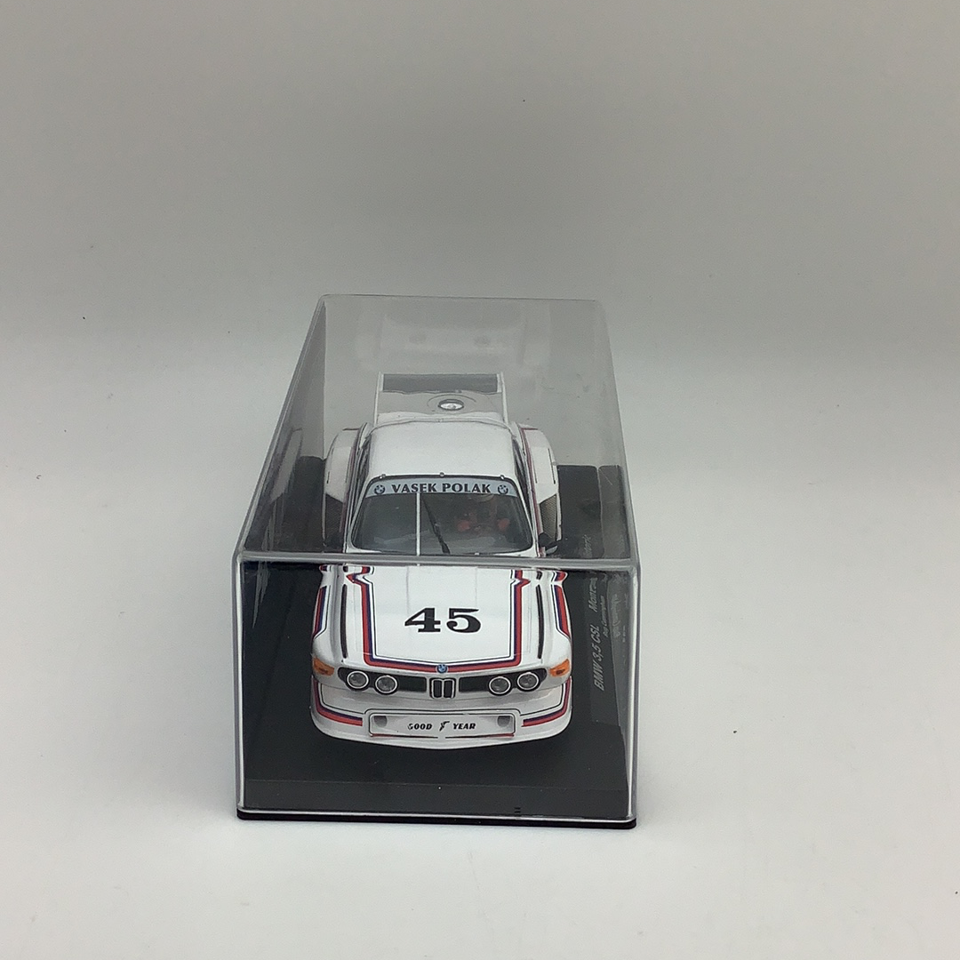 Slot car of a white BMW 3.5 CSL race car in a clear box for Fly Car 96036