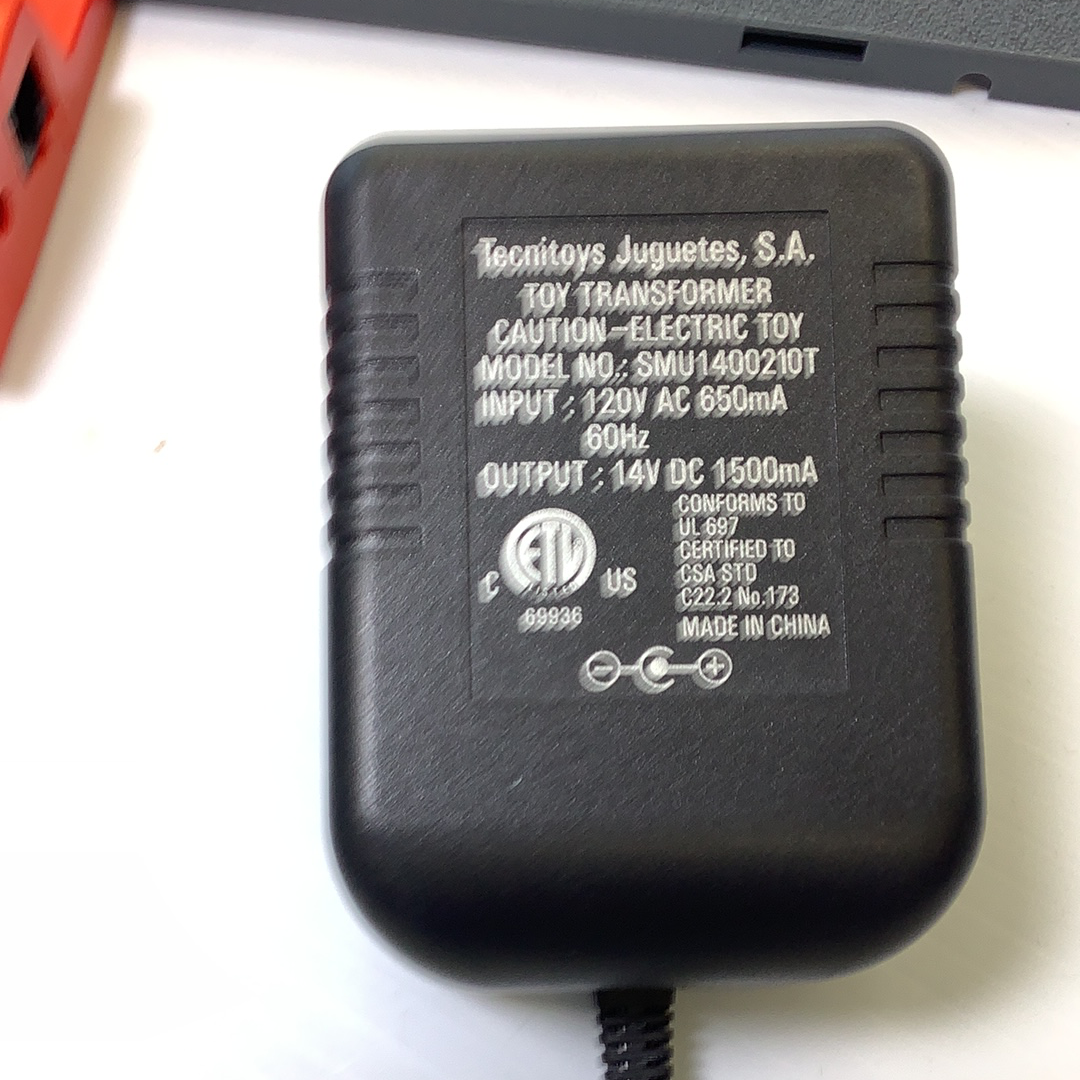 Black power transformer with visible electrical specifications and connections for SCX A4000