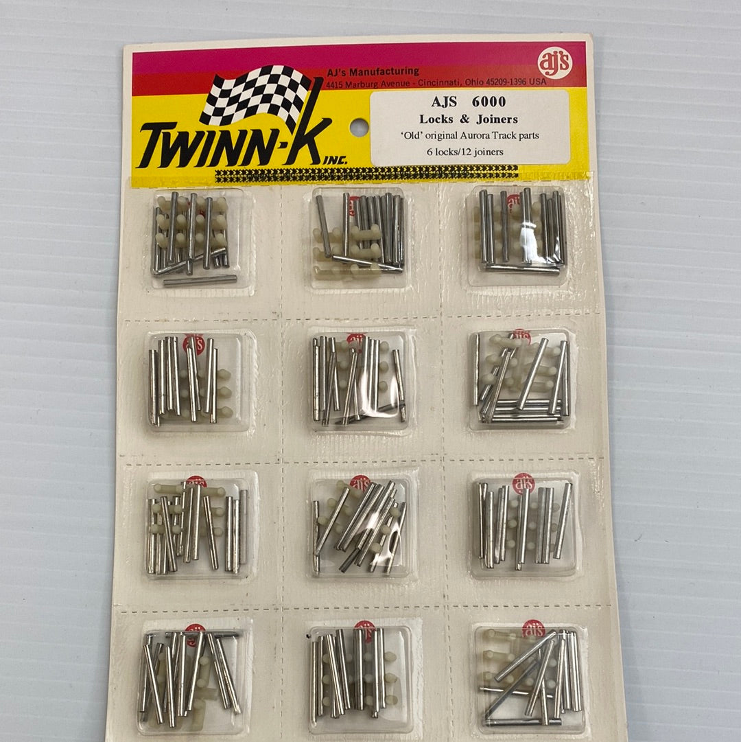 Assortment of metal track lock and joiner pieces for slot cars for AJ'S Slot Car Parts 6000, alternate track view