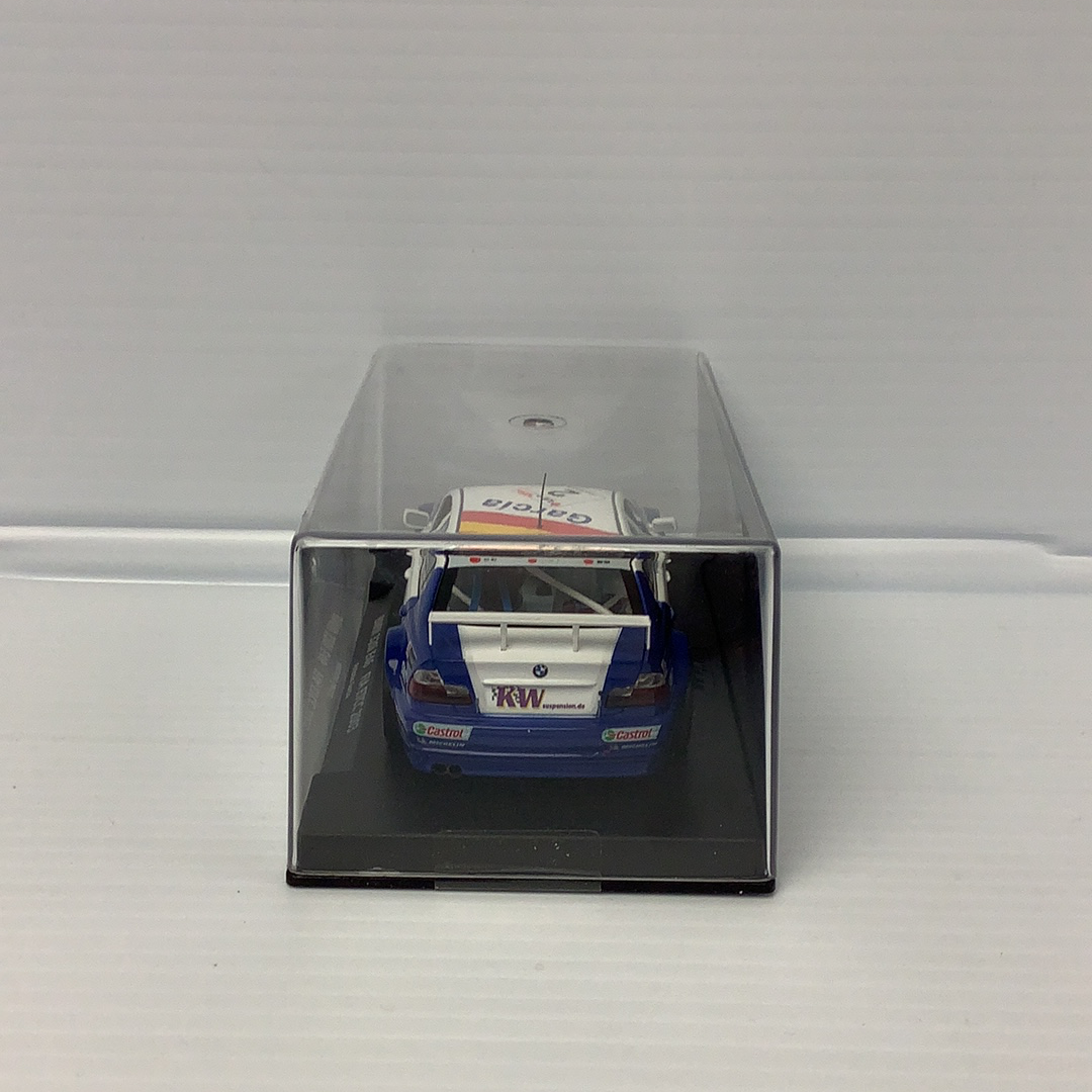 Blue BMW race car in a clear display case for Fly Car 88123
