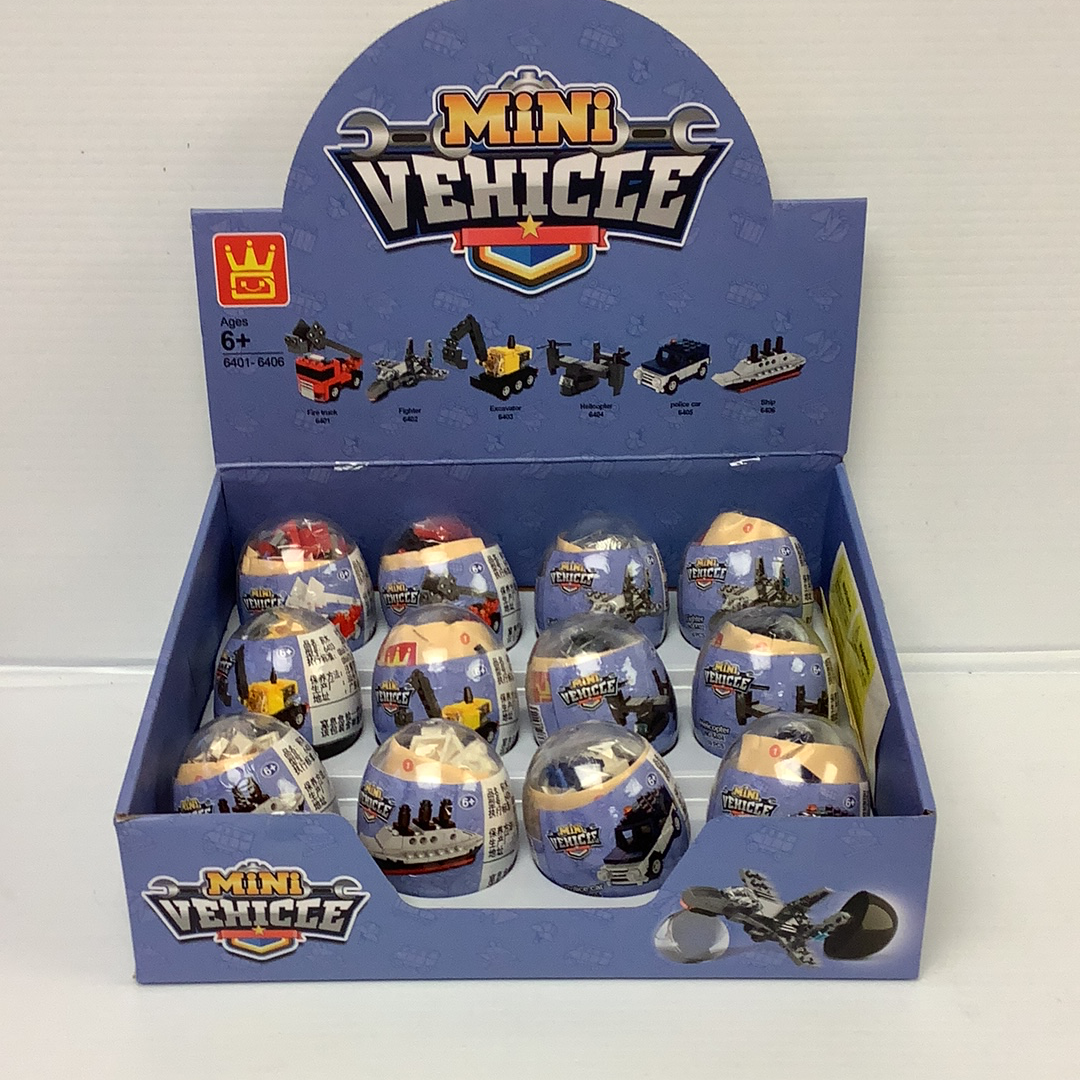 Assortment of mini vehicle themed eggs in a display box for IMEX Model Company WAG64016