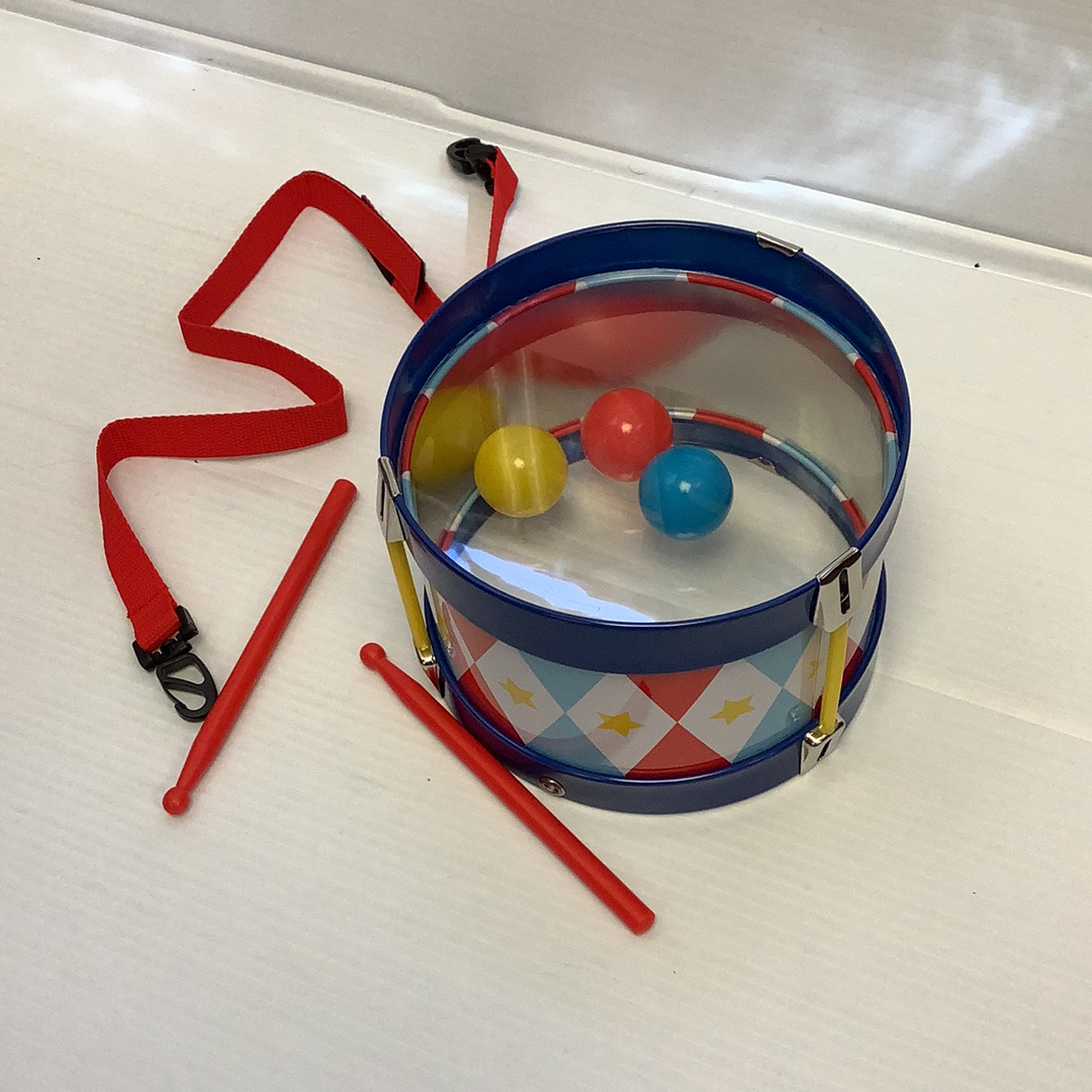Toy drum with mallets and strap, featuring colorful balls inside for Schylling TD