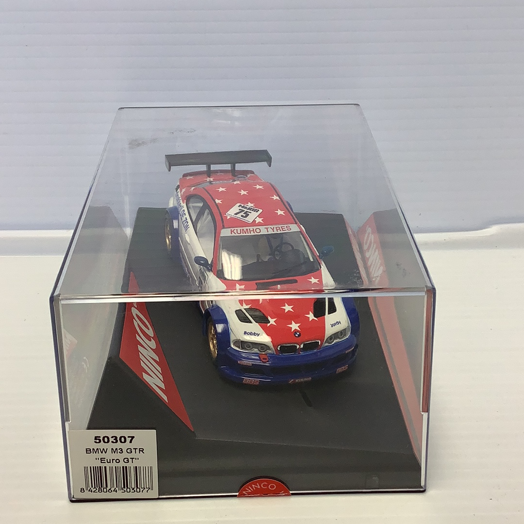 Red and white BMW M3 GTR race car in clear display box for Ninco 50307