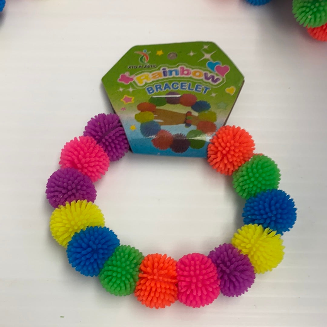Rainbow pompom bracelet with colorful, textured, spherical beads for BVP 12715