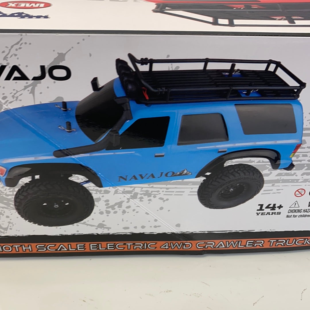 Blue remote-controlled SUV crawler truck with off-road tires and roof rack for IMEX 22020