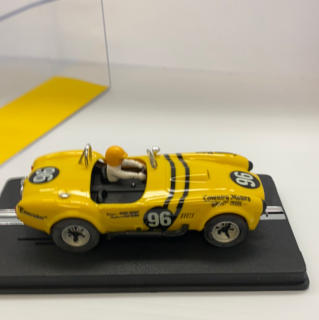 Yellow 1964 Shelby Cobra slot car with driver for REPROTEC RT/1964