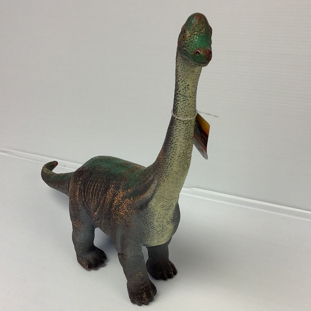 Dinosaur toy figure, long neck, standing on a white surface for IMEX Model IMX49401