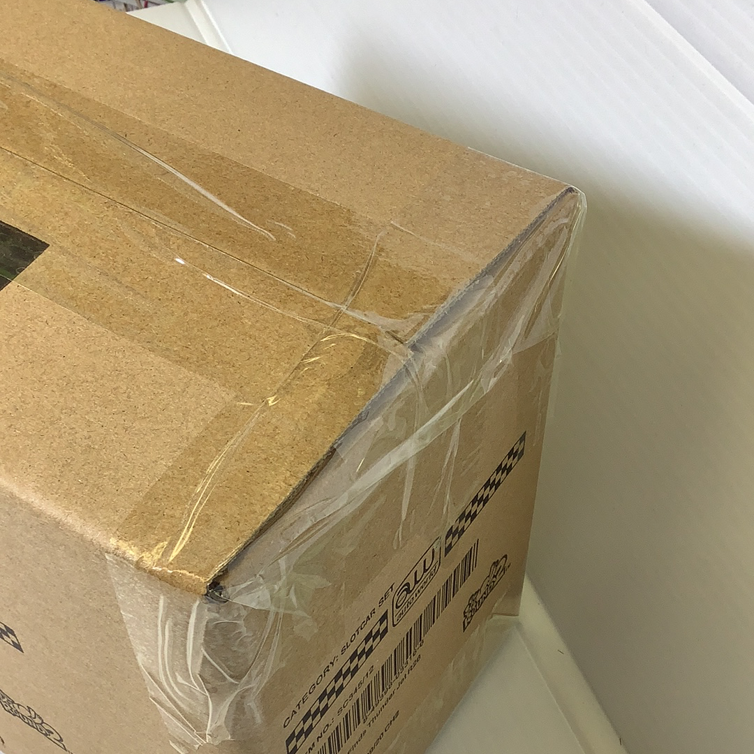 Cardboard box containing Thunderjet release 26 cars for SC345