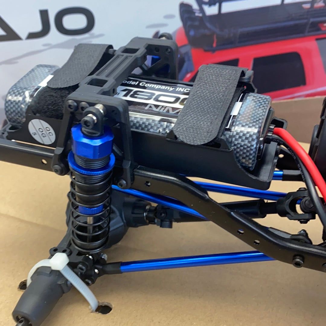 Crawler truck chassis with blue suspension components and black body panels for IMEX 22020