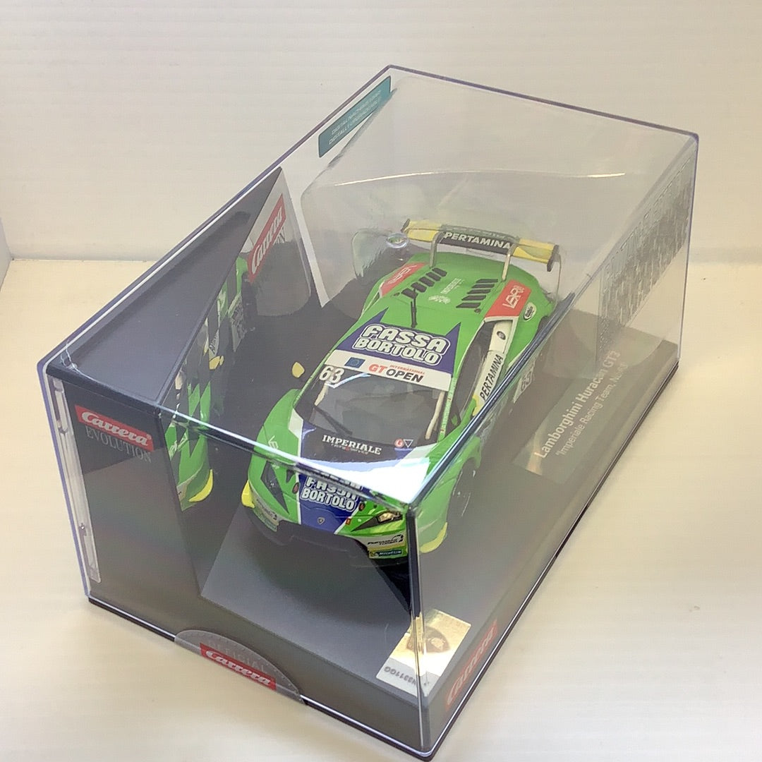 Slot car of a green Lamborghini Huracan GT3 race car in a display box for Carrera 27589