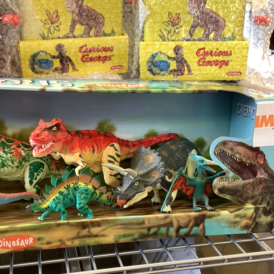 Dinosaur toy set featuring various prehistoric reptiles in a display case for 12 dinosaurs 49010, display case view, product view 5
