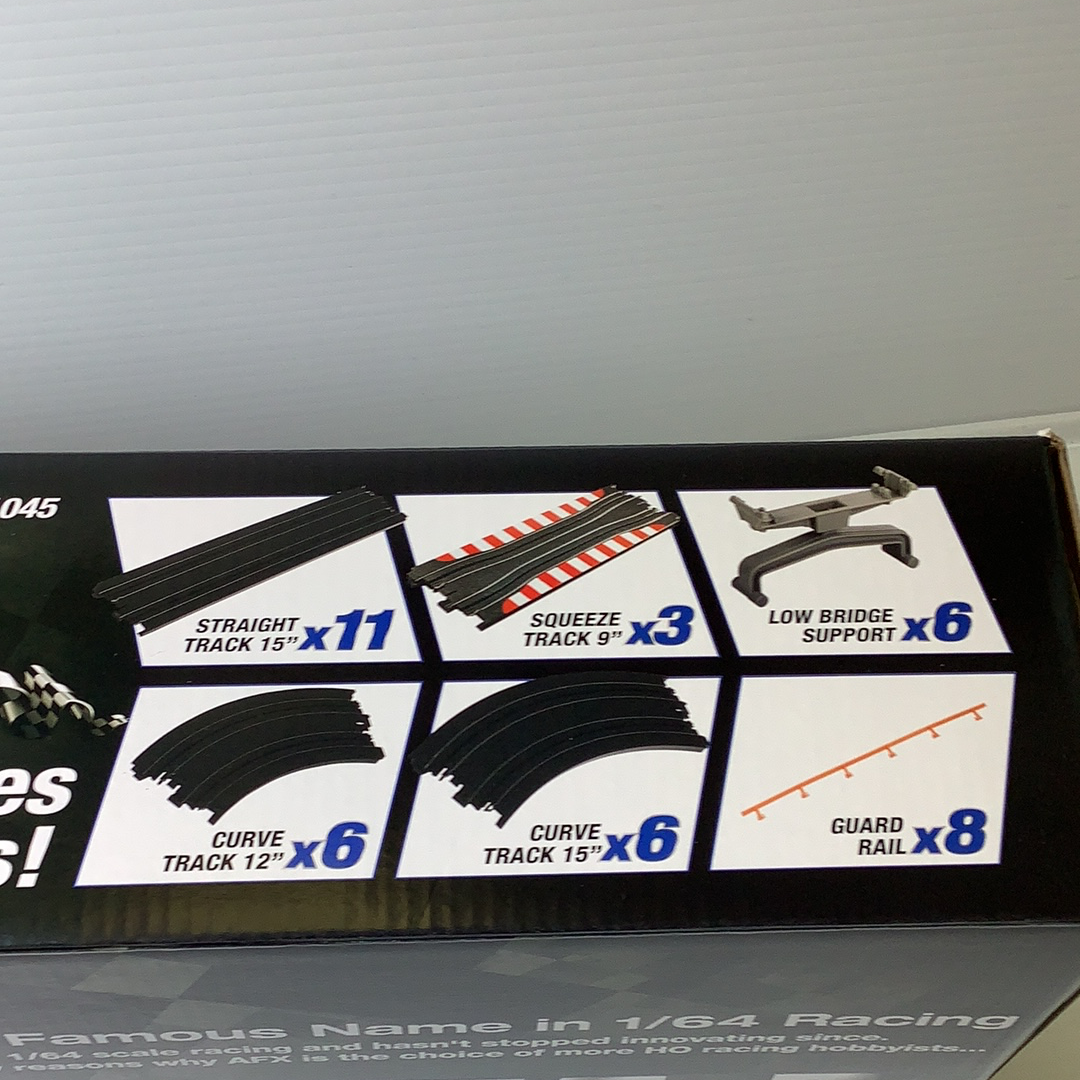 Assortment of model train track pieces: straight, curve, and support sections for AFX/Racemaster 21045
