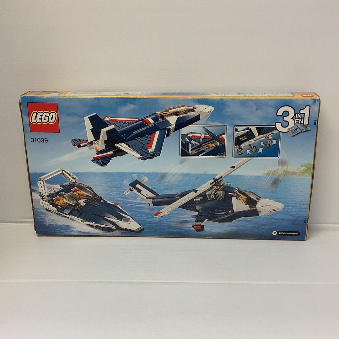 LEGO set box showing three blue and white jet aircraft models for 31039