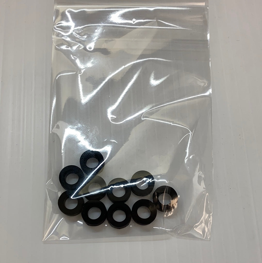 Set of ten black slot car rear tires in clear packaging for Auto World CP7907, package view, product view 1