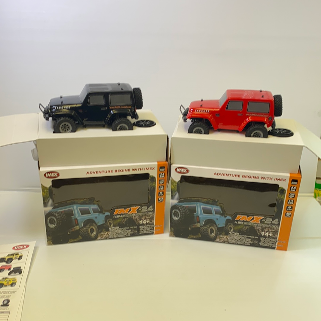 Black and red remote-controlled crawlers with packaging for IMX IMX25055