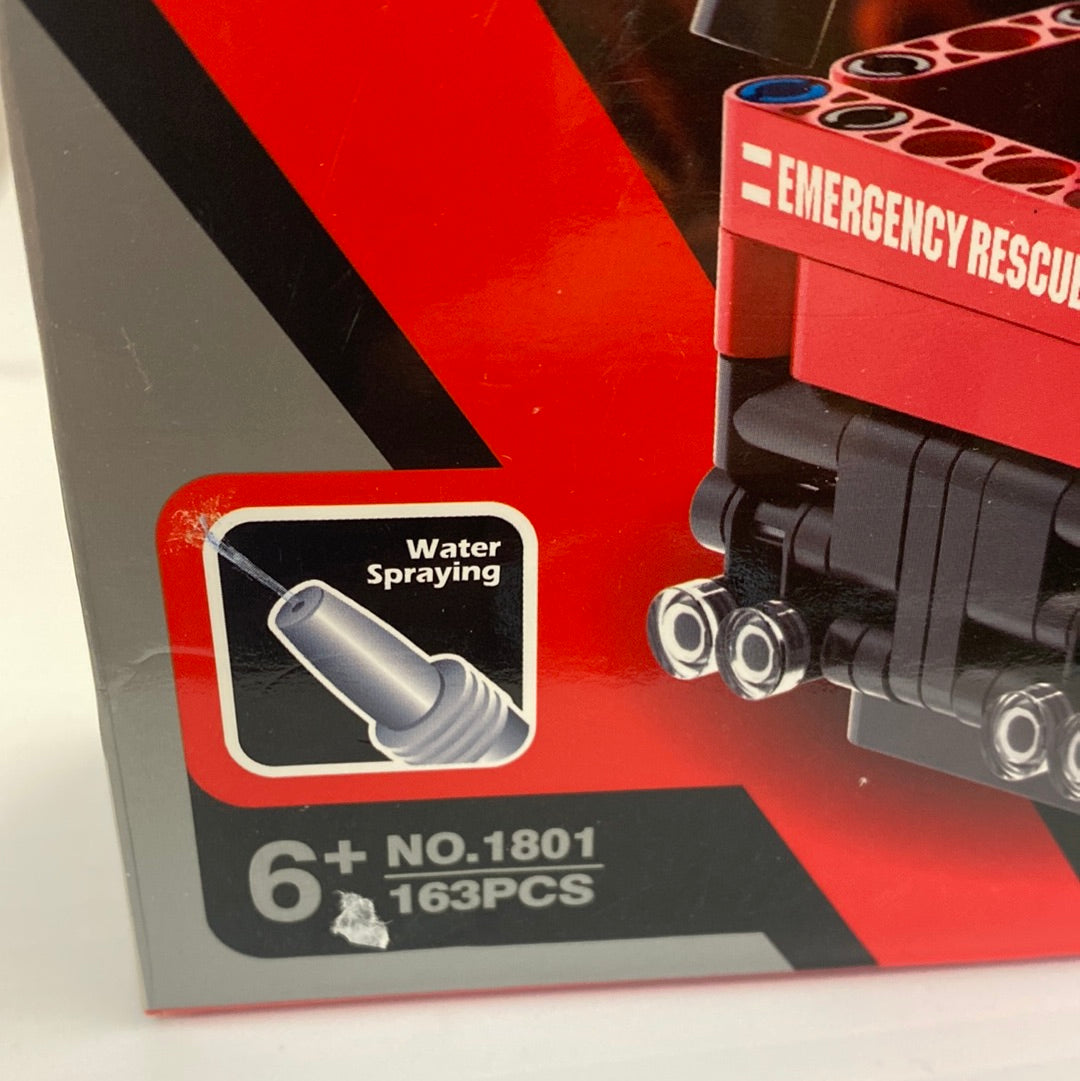 Toy set box showing a water spraying attachment and a red fire truck model for Qihui QIH01801