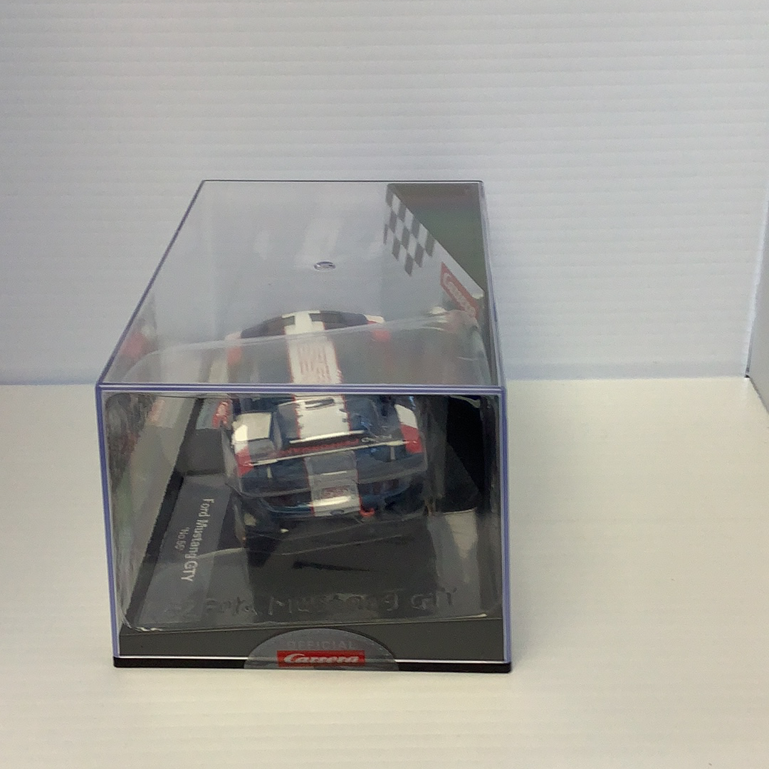 Slot car Ford Mustang GTY race car in its display box for Carrera Evolution 27637