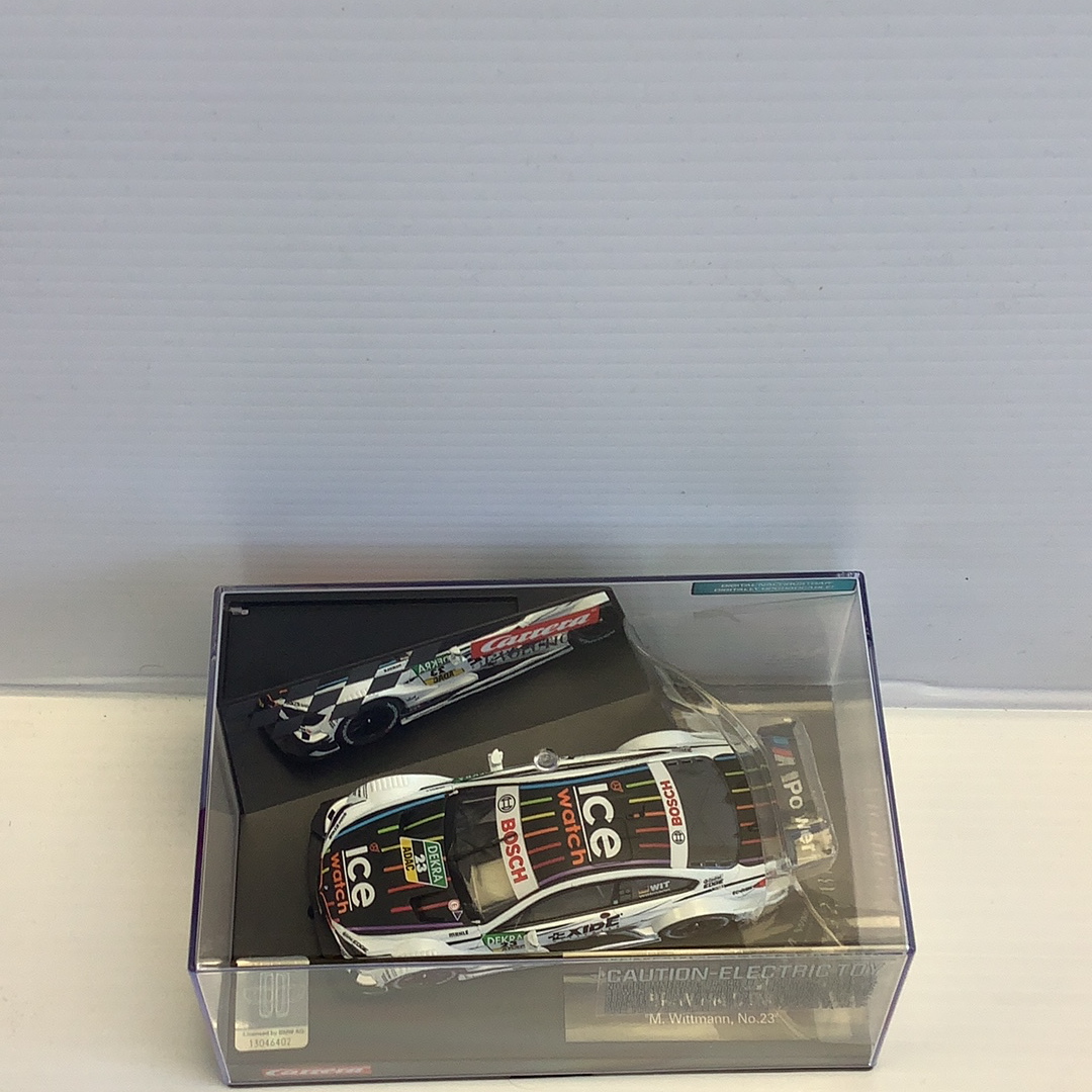 Slot car BMW M4 DTM race car in box, M. Wittmann, No. 23 for Carrera Evolution 27499