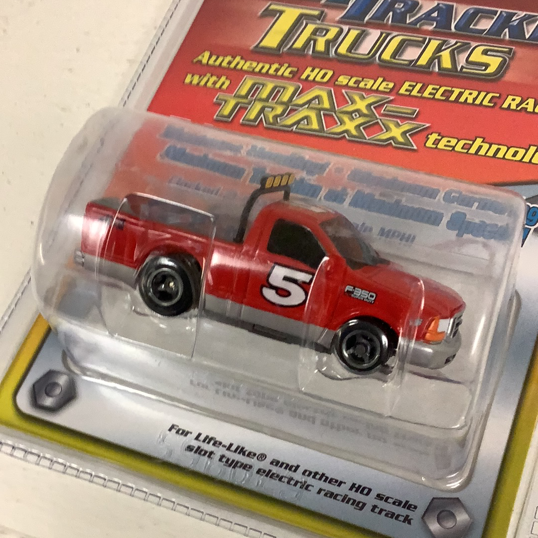 Red and silver slot car toy truck with number 5 on the side for Life-Like Racing Fast Trackers 9794