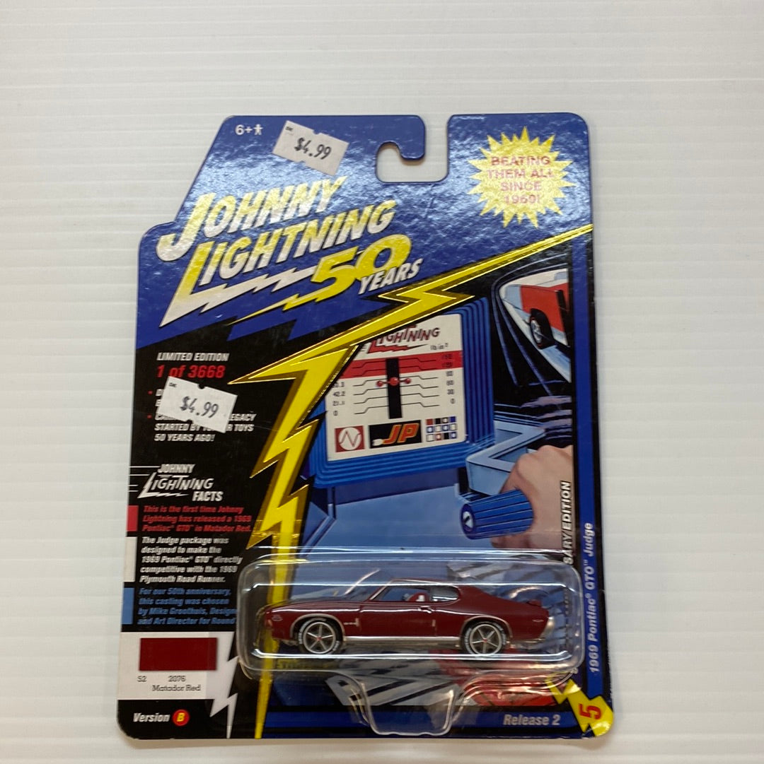 die-cast car toy packaging featuring a red 1969 Pontiac GTO for Johnny Lightning JLCG020