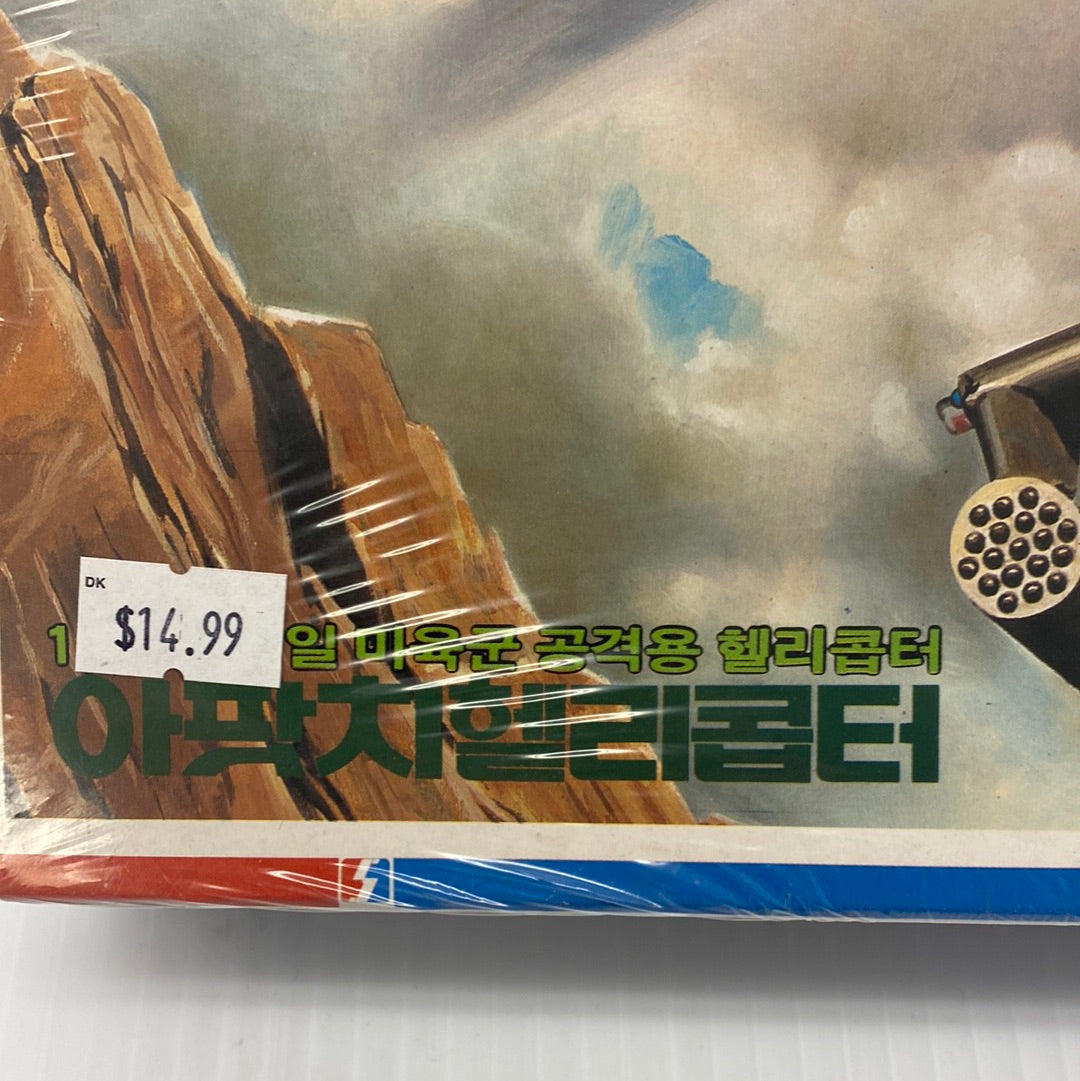 Model kit box art showing an AH-64 Apache helicopter against a dramatic sky for Semina Models FS001