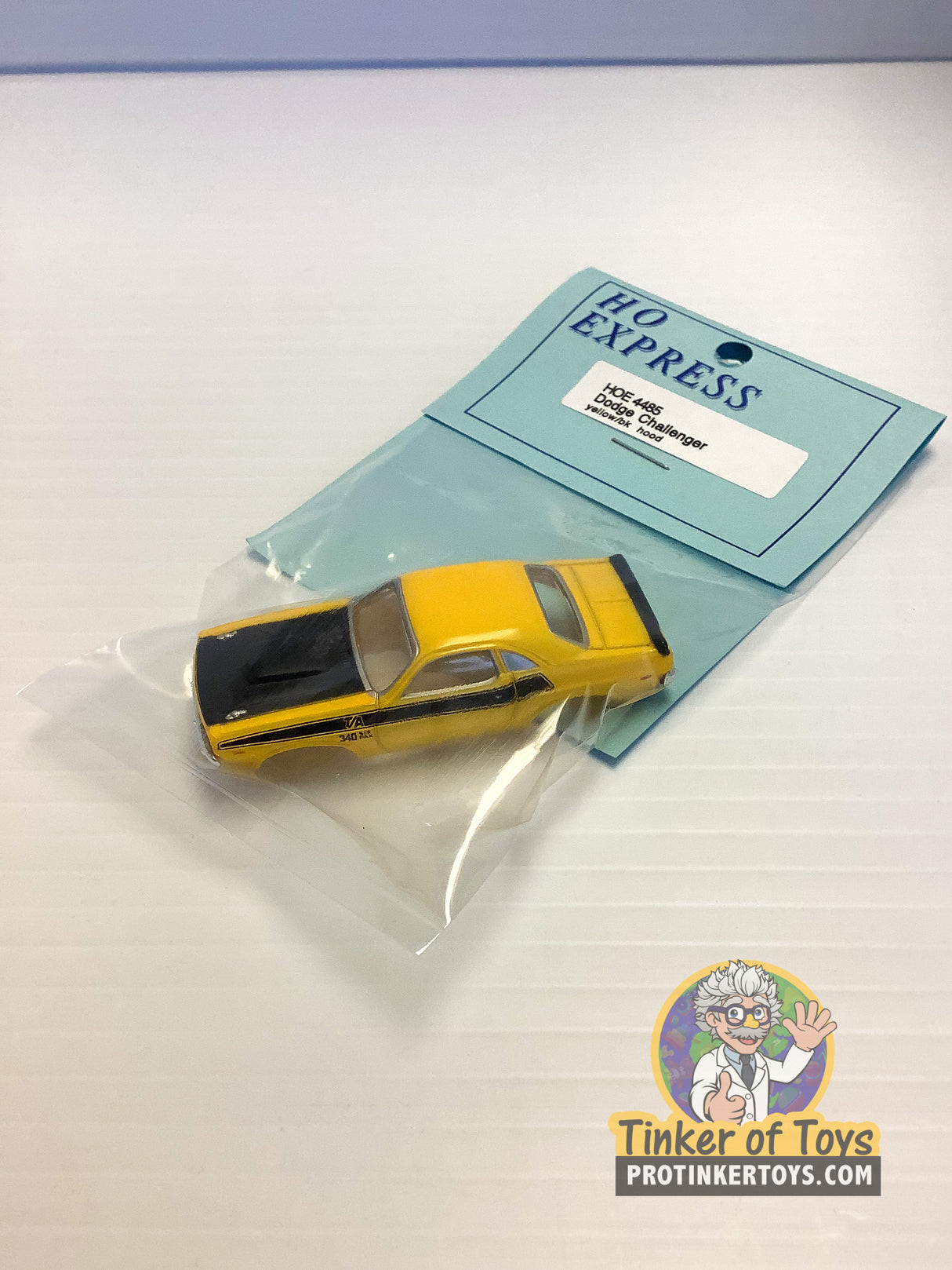 Yellow Dodge Challenger model car with packaging for HO Express 4485