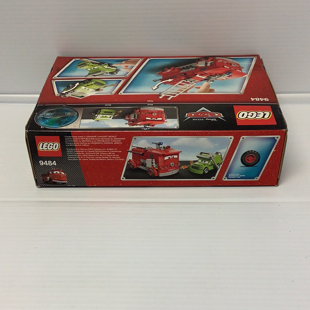 LEGO set box showing water rescue vehicles: boat, truck, and ladder for 9484