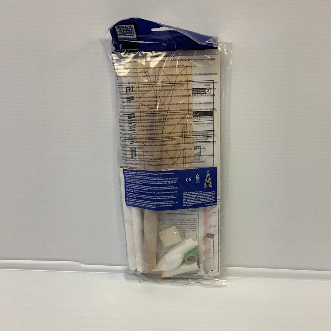 Rocket model kit contents in clear plastic packaging for Estes 7232