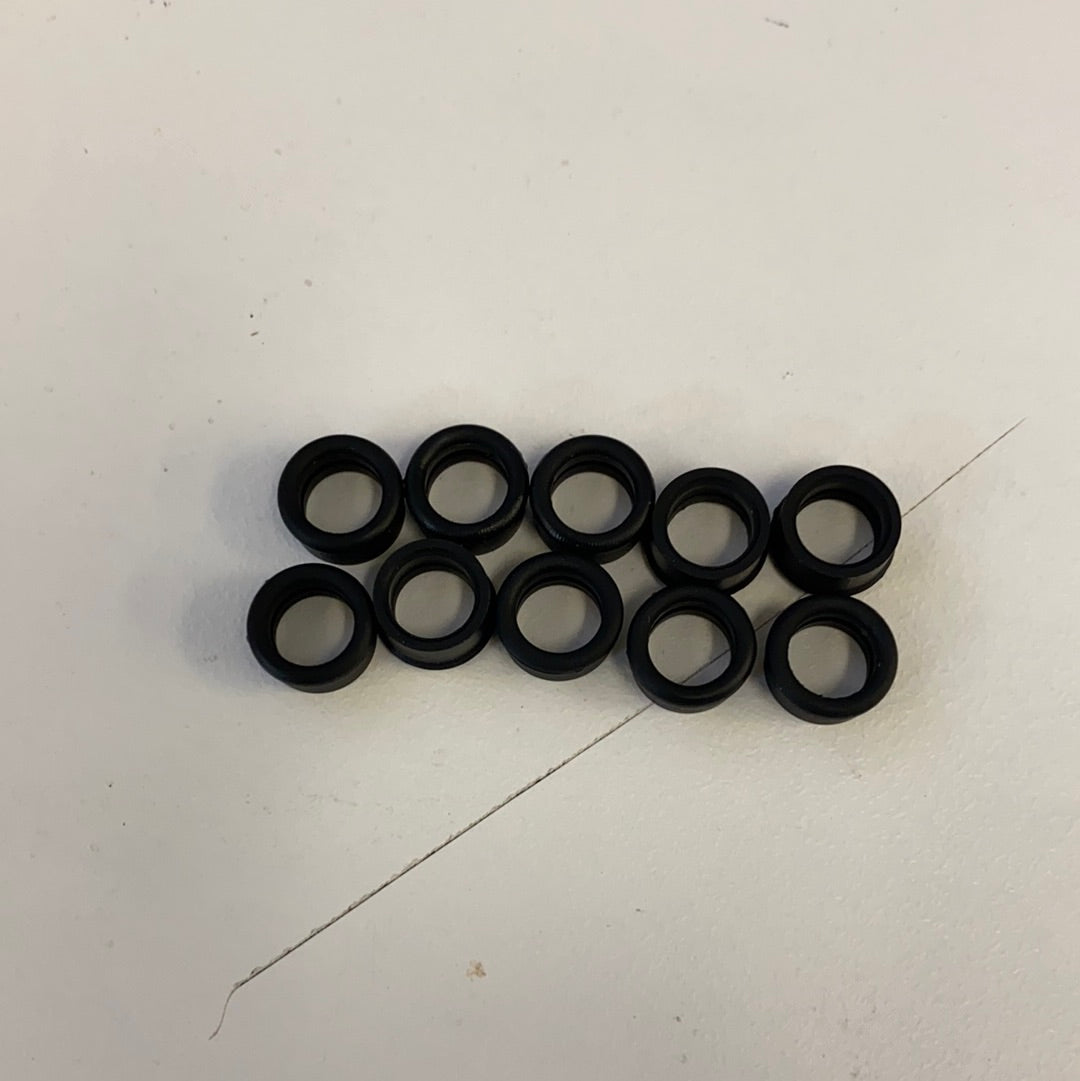 Set of ten black slot car front tires for model cars for Auto World CP7908, rear view