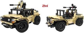 Two remote-controlled, armed off-road vehicles for building and play for Qihui QIH08022