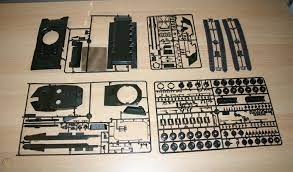 Tank model kit parts laid out on a surface for Italeri 365