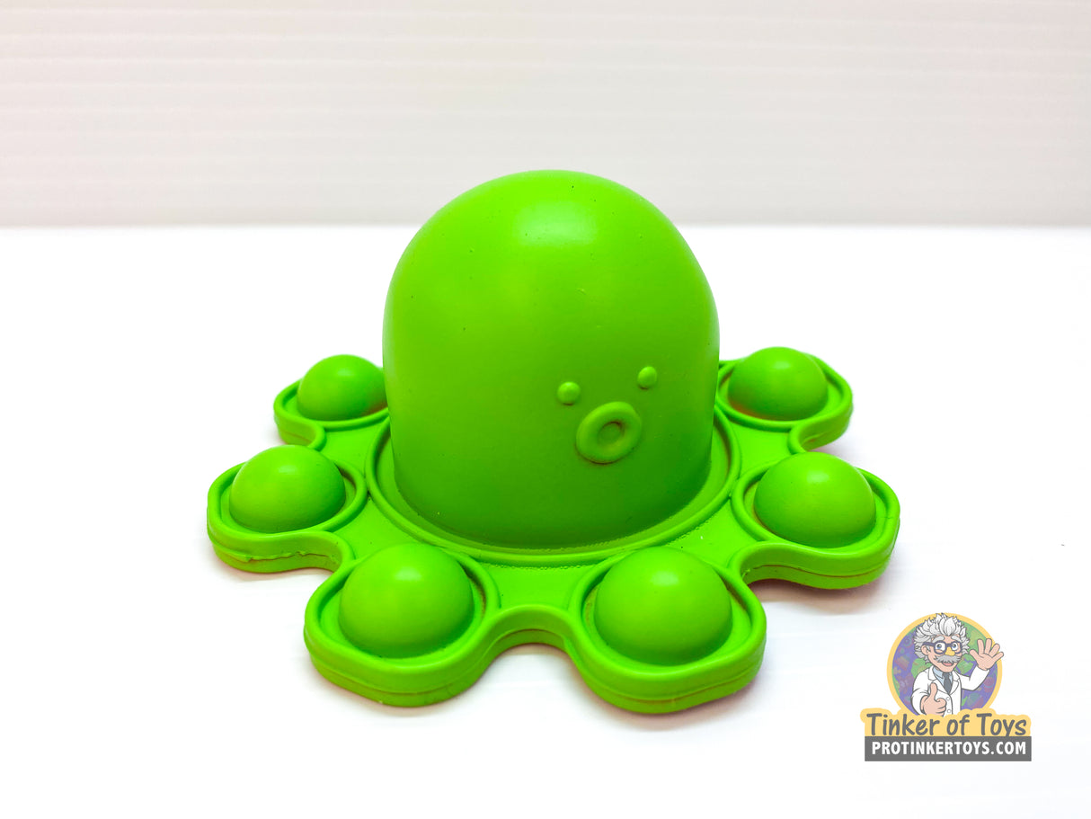 Green pop-it octopus toy with a round head and multiple bubble sections for BVP 88782