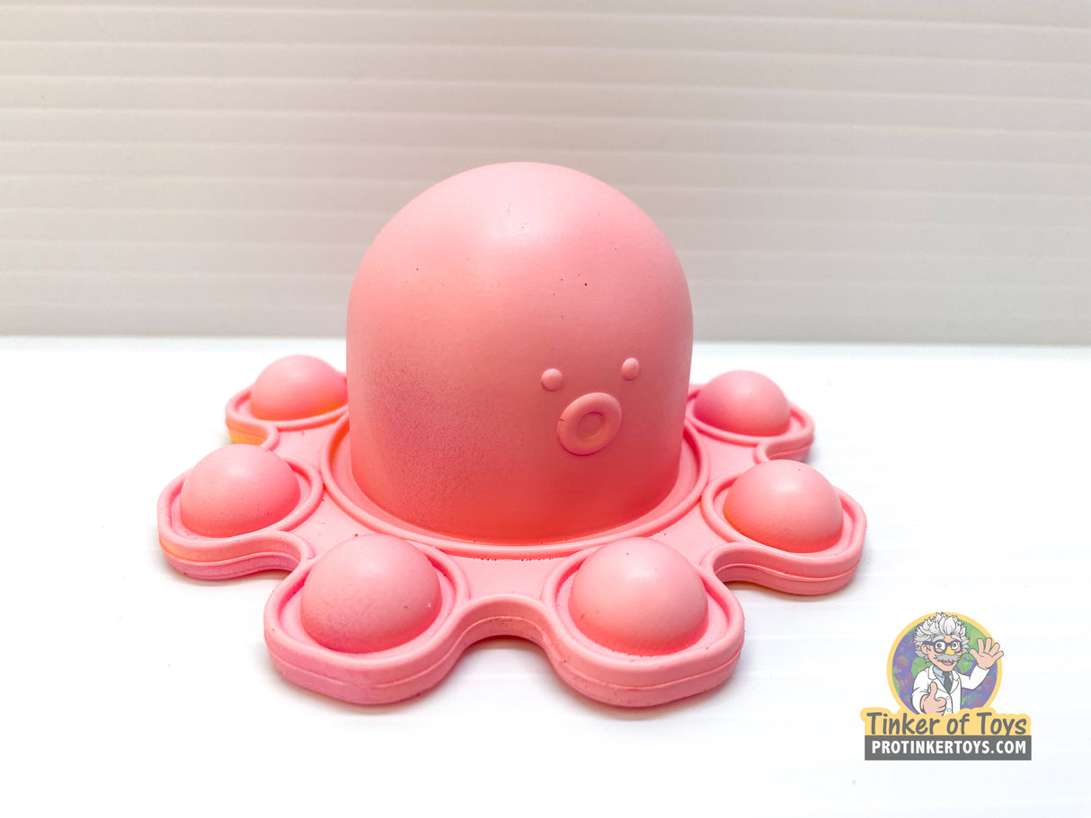 Pink octopus squishy toy with multiple round suction cups for BVP 88782
