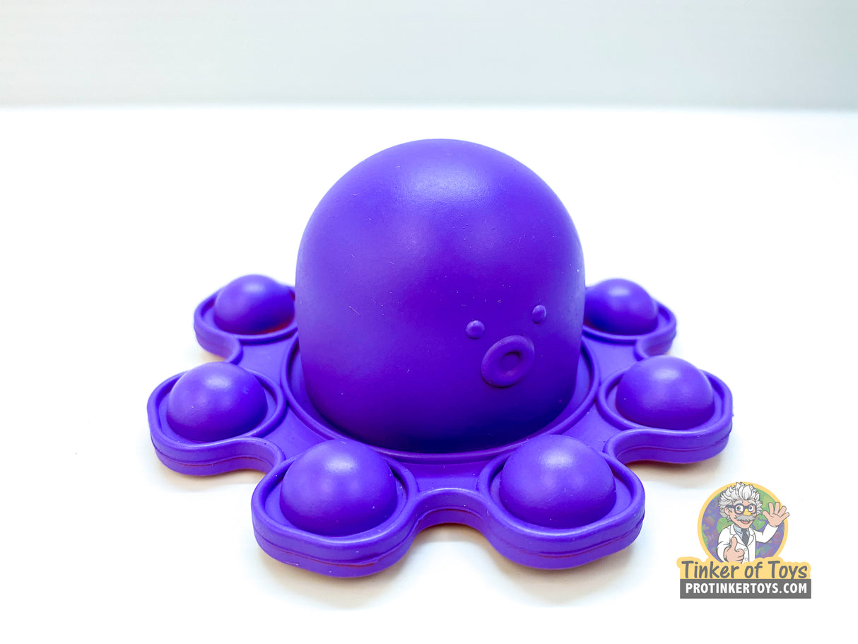 Purple octopus sensory toy with multiple popping balls for BVP 88782