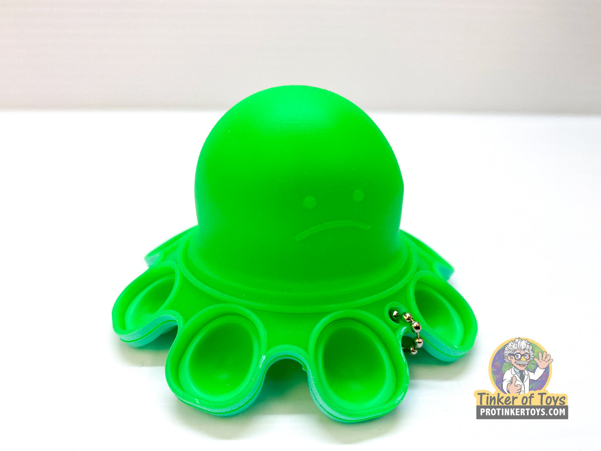 Bright green, smiling octopus-shaped sensory toy for BVP 88782