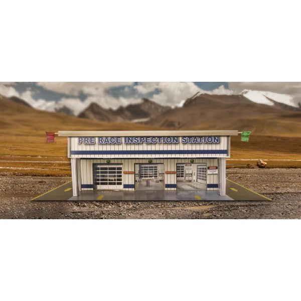 Model kit of a pre-race inspection station building in a natural setting for Innovative Hobby Supply BK6442