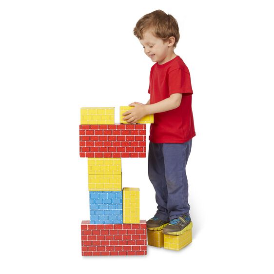 Boy building with colorful, stackable cardboard blocks for Melissa and Doug 2783