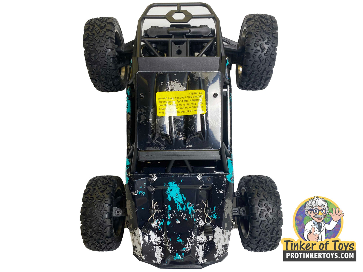 Black and blue remote-controlled desert truck with large off-road tires for IMEX IMX19030