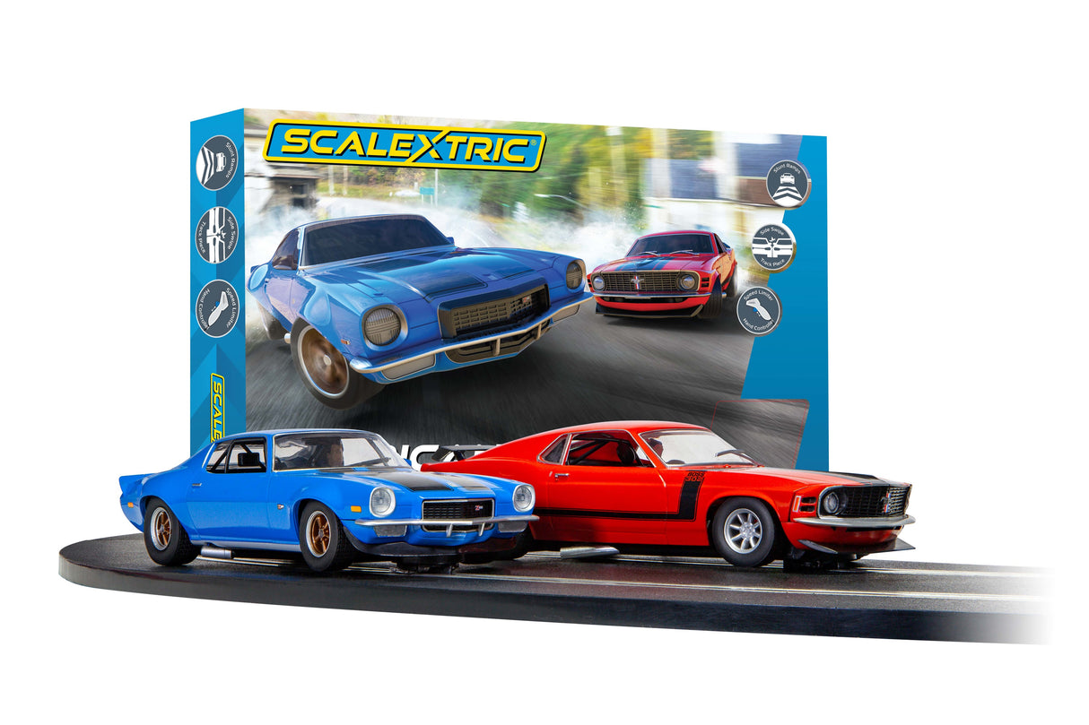 Blue and red slot cars on a track display set for Scalextric 1/32 C1429T