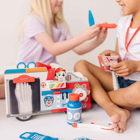Kids play with a Paw Patrol Marshall wooden rescue toy set for Melissa and Doug 33276
