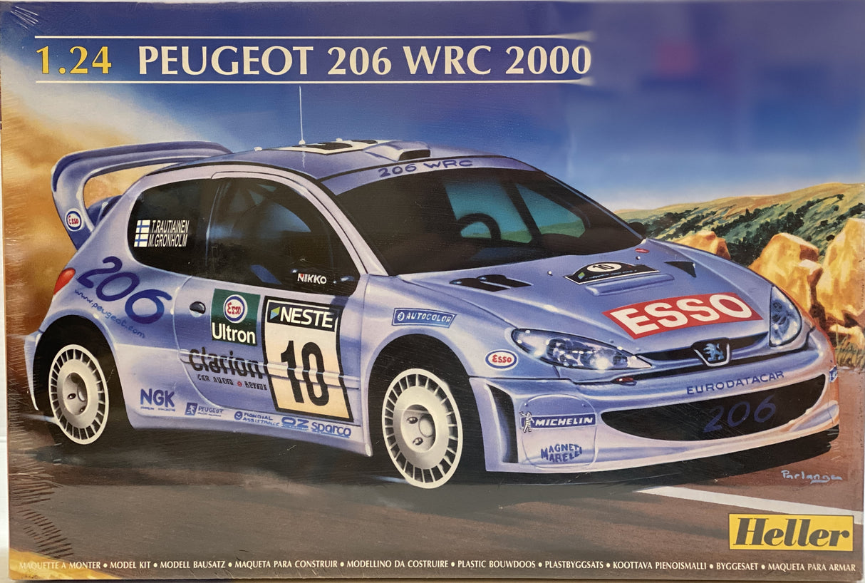 Blue 1:24 scale model of a Peugeot 206 WRC race car from 2000 for Heller