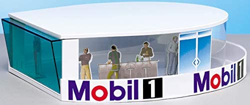 Diorama set showing figures and a "Mobil 1" sign for Carrera 21103
