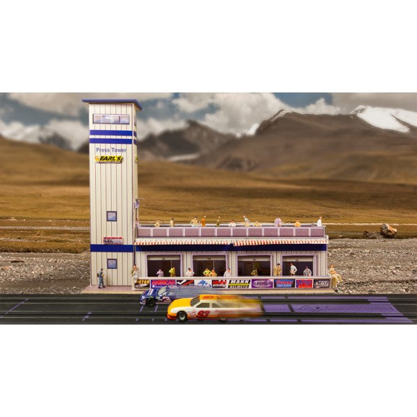 Model kit display: press tower and building with cars on a track for Innovative Hobby Supply BK6424