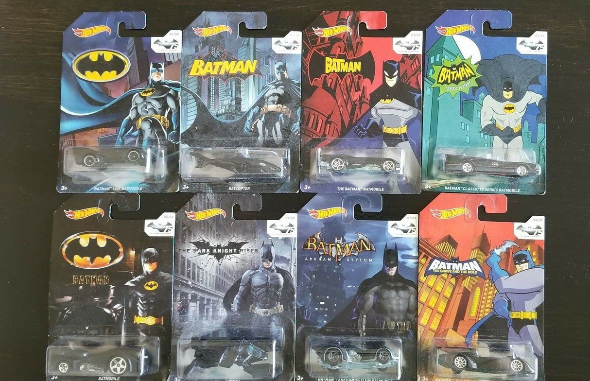 Eight Batman die-cast car sets displayed in blister packaging for Hot Wheels 1 - 8