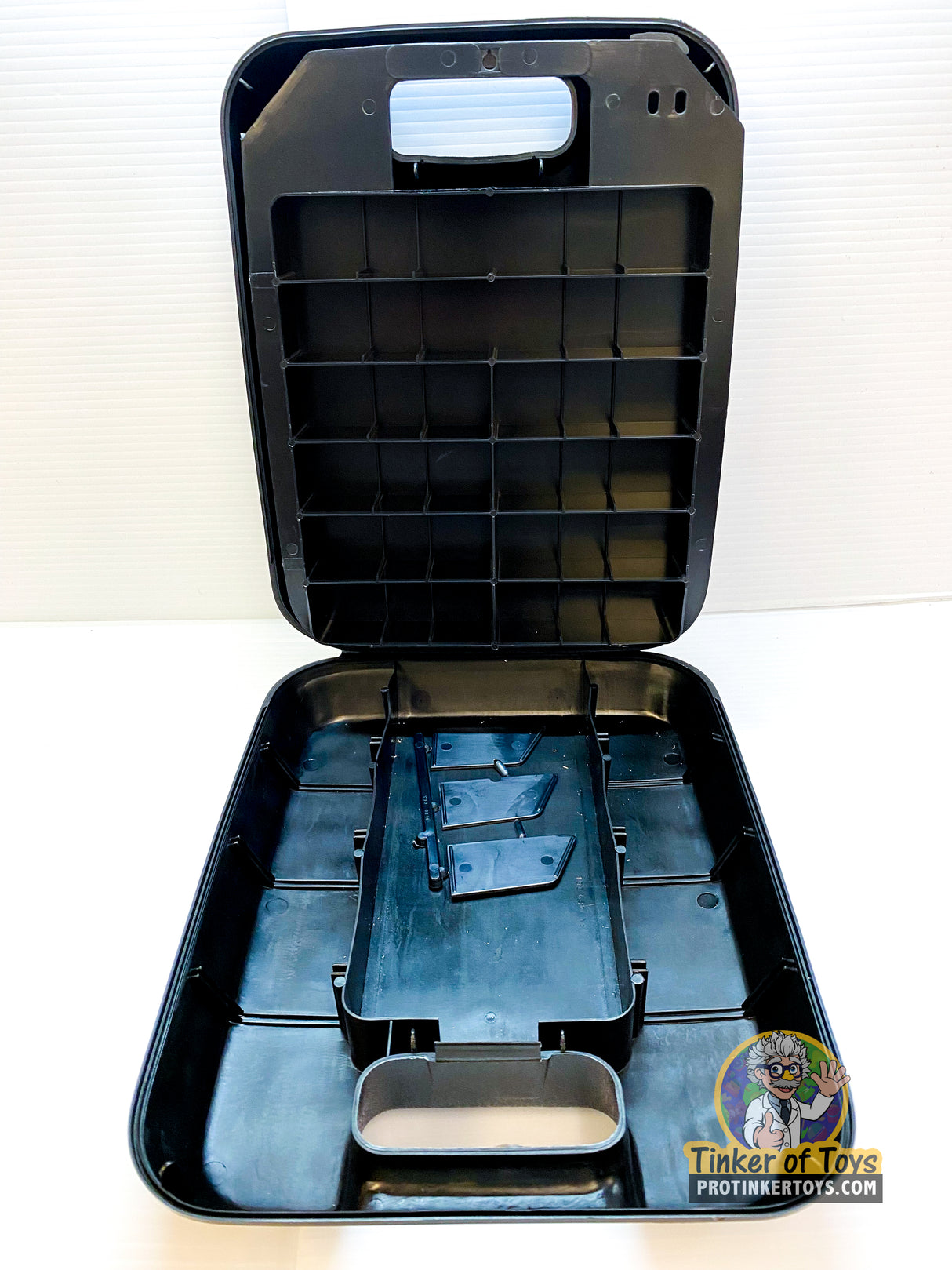 Open black storage case with tiered compartments and removable tray for Aurora AFX 1489