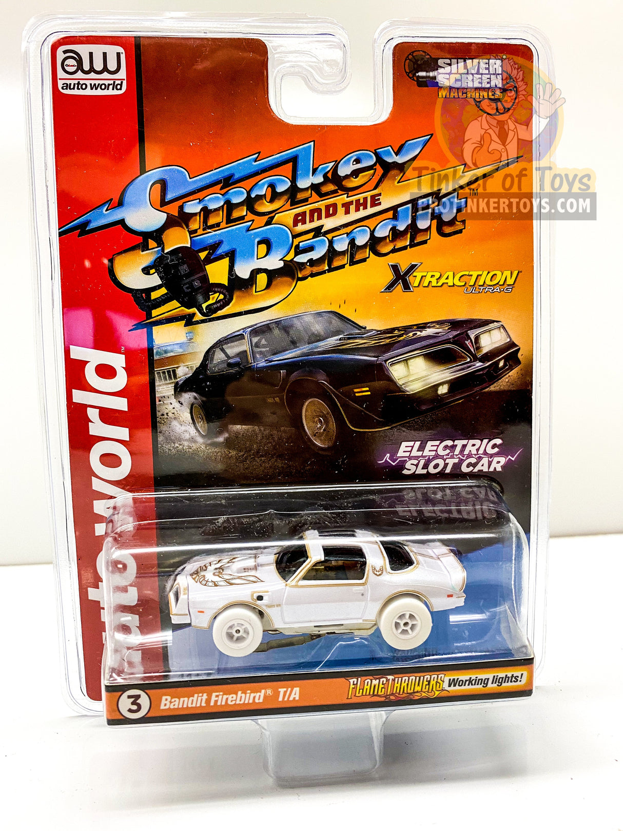 White and black slot car toy set featuring KITT and Bandit Firebird for Auto World