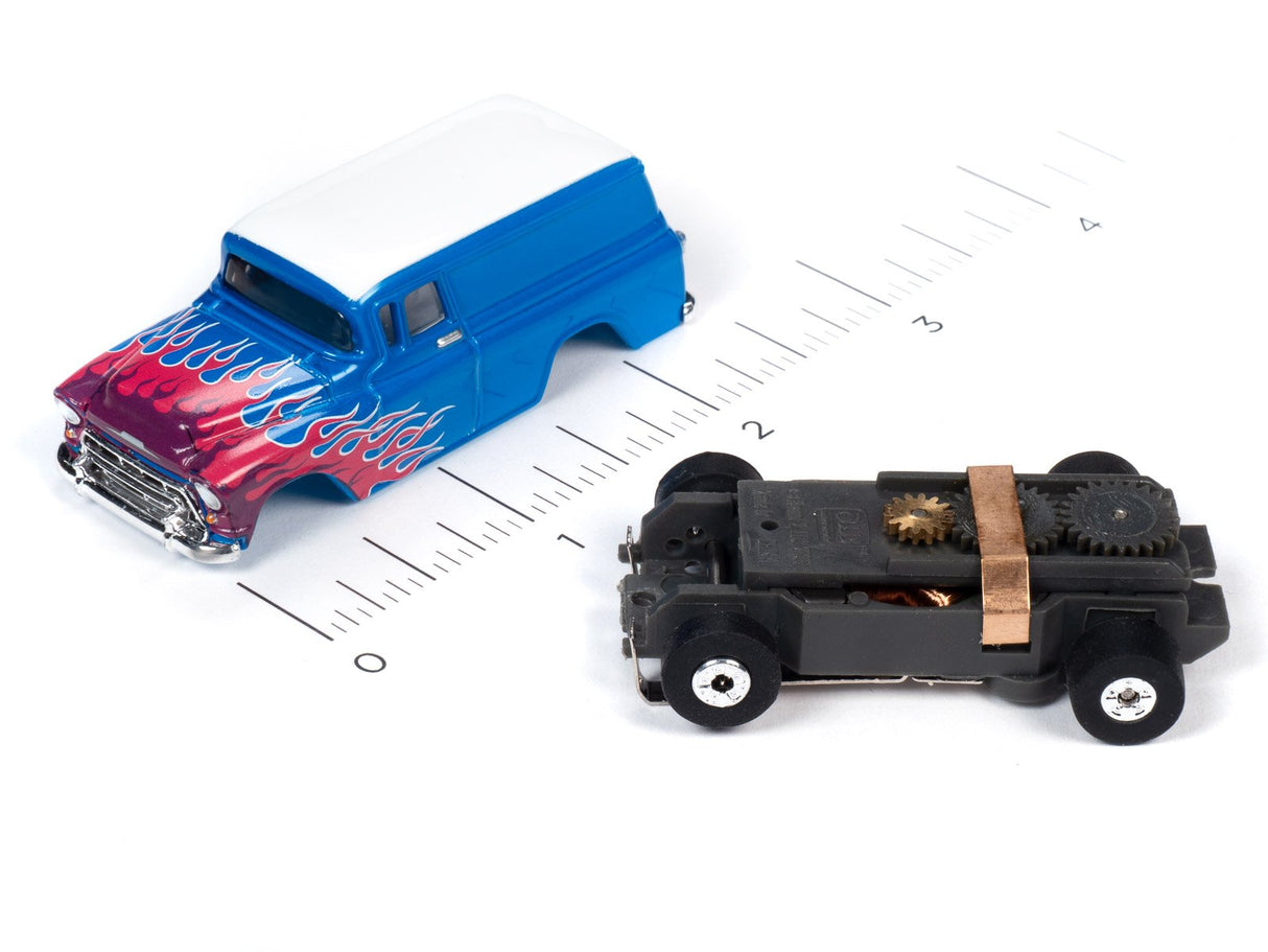 Blue car with flames and black toy car on a ruler for Auto World SC353