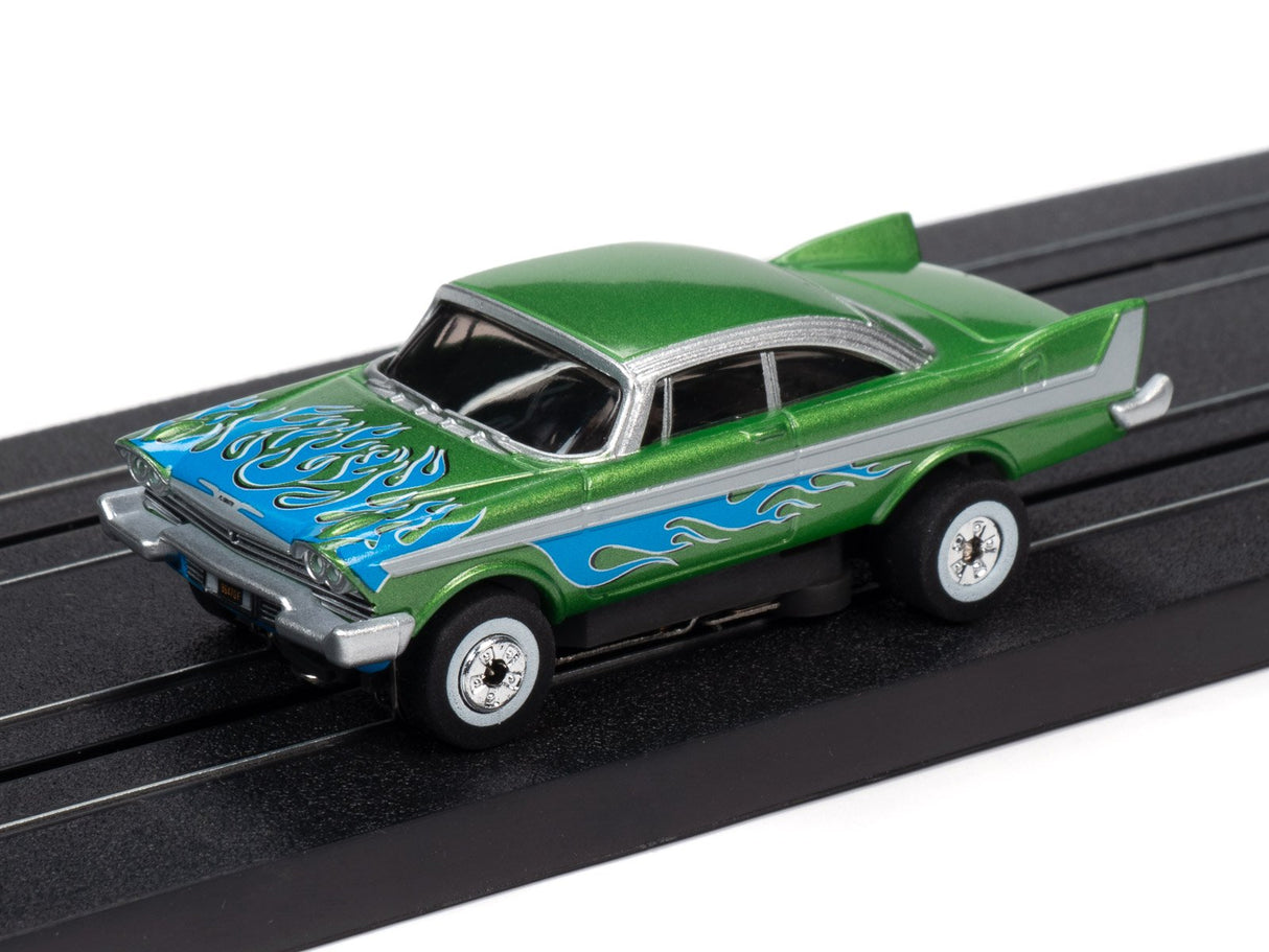 Green and blue classic car toy with flame decals on a black track for Auto World SC353